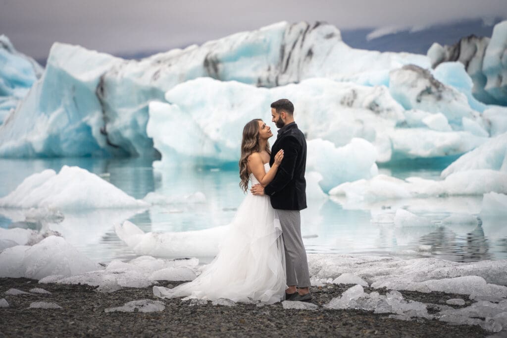 Wedding at Jokulsarlon Glacier Lagoon in Iceland with large icebergs in the background
