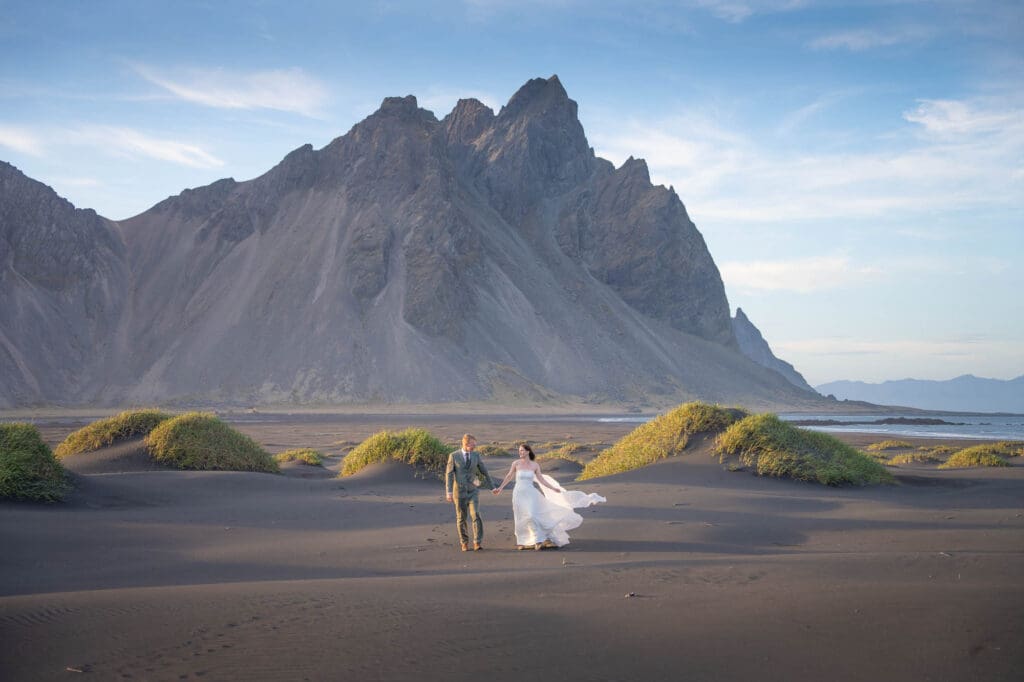 Elopement among black sand dunes at Vestrahorn in Iceland