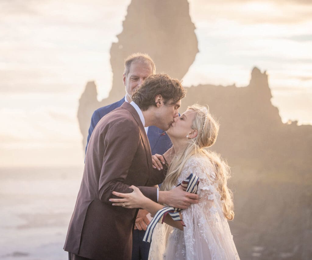 First kiss during micro wedding at Snaefellsnes Peninsula